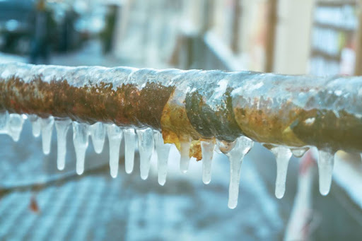 A pipe with ice on it.